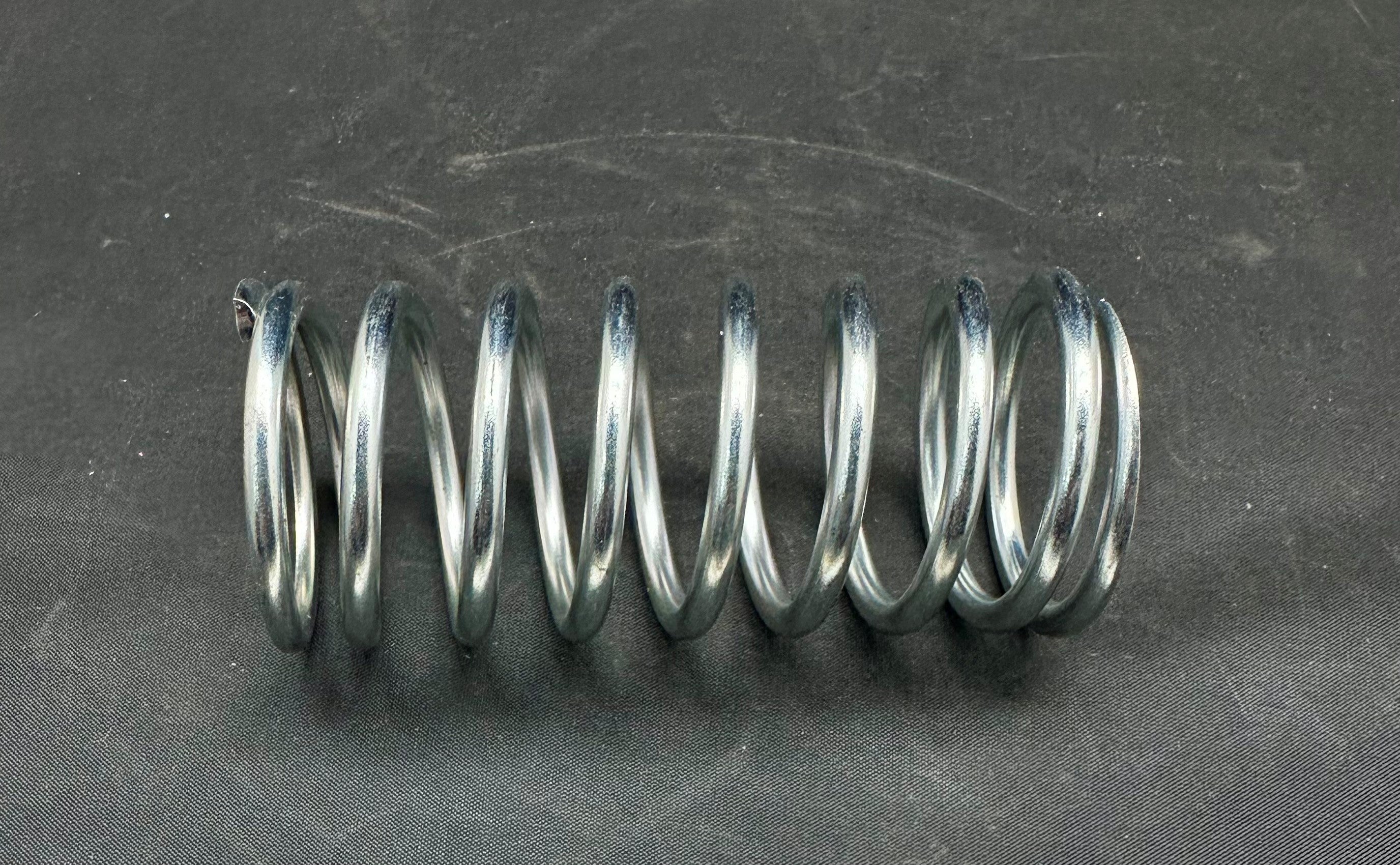 539616001 - SPRING-1.50 OD X 3.25 LG X .149 WD A228.