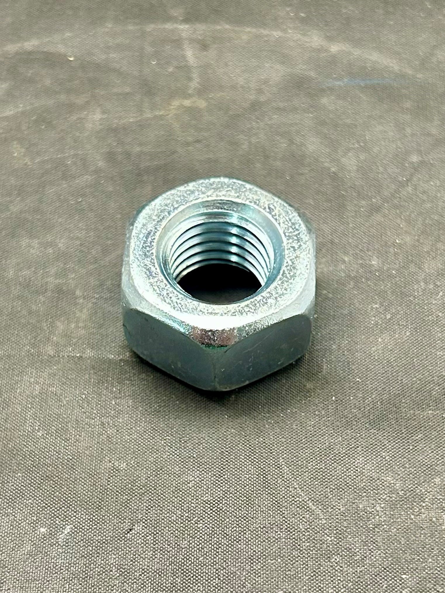 642138405 - NUT - 5/8-11 HEX HVY SF 39/64 THICK
